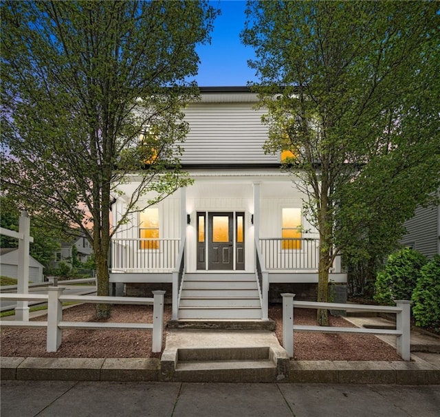 1314 Chalkstone Ave, Providence, RI 02908 - view of front of home featuring a porch and a fenced front yard