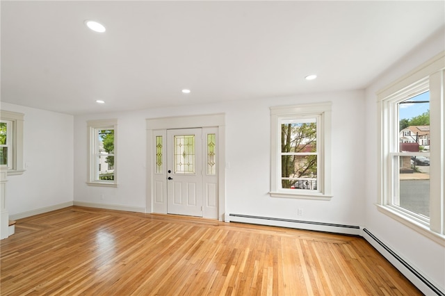 1314 Chalkstone Ave, Providence, RI 02908 - entrance foyer with a baseboard heating unit, healthy amount of natural light, light wood-type flooring, and recessed lighting