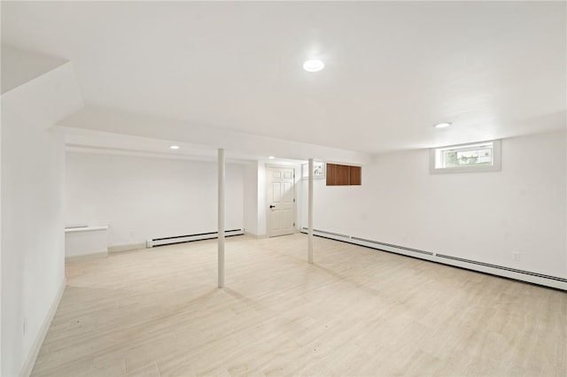 1314 Chalkstone Ave, Providence, RI 02908 - basement with a baseboard radiator, recessed lighting, and light wood-style flooring