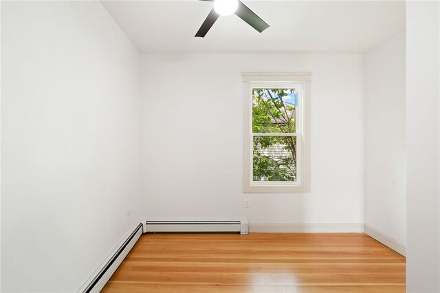 1314 Chalkstone Ave, Providence, RI 02908 - unfurnished room featuring a baseboard heating unit, light wood finished floors, and a ceiling fan