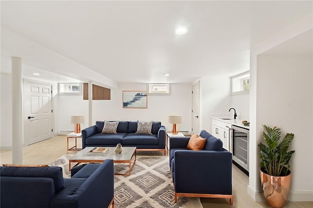 1314 Chalkstone Ave, Providence, RI 02908 - living area with beverage cooler, light wood-style flooring, recessed lighting, and bar