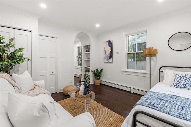 51 Poplar St Unit 1R, Newport, RI 02840 - bedroom featuring dark wood finished floors, arched walkways, baseboard heating, ornamental molding, and recessed lighting