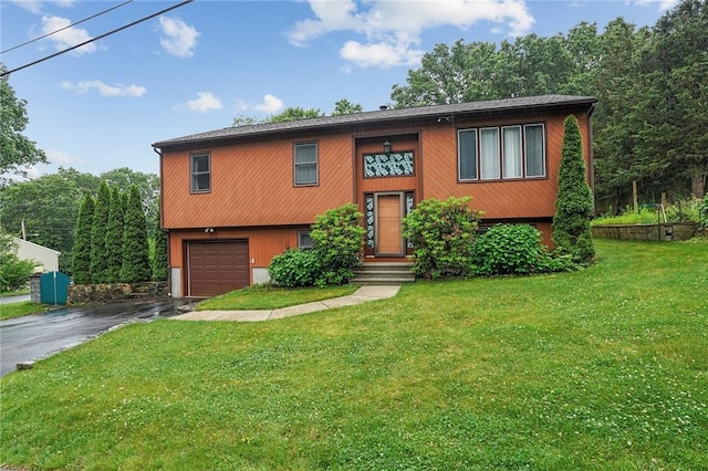 2 Birch St, Johnston, RI 02919 - raised ranch with driveway, a garage, and a front yard