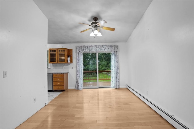 2 Birch St, Johnston, RI 02919 - unfurnished living room featuring a baseboard heating unit, ceiling fan, and light wood-style flooring