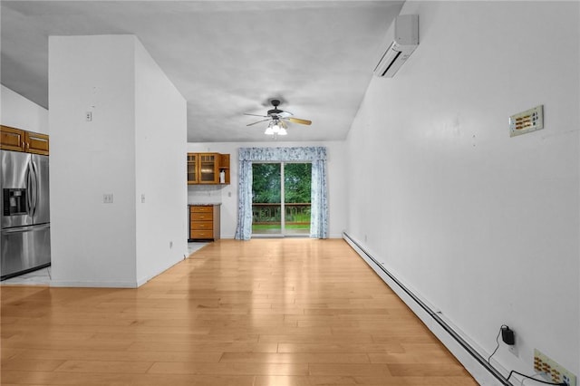 2 Birch St, Johnston, RI 02919 - unfurnished living room with a wall unit AC, a ceiling fan, light wood-style flooring, and baseboard heating