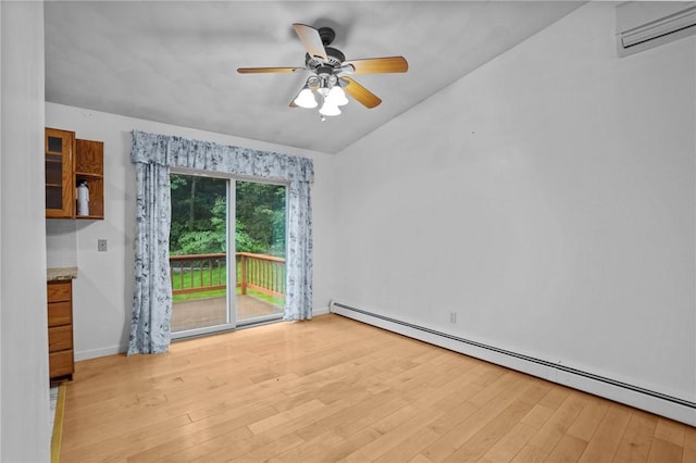 2 Birch St, Johnston, RI 02919 - spare room featuring baseboard heating, a wall mounted AC, light wood-type flooring, vaulted ceiling, and ceiling fan