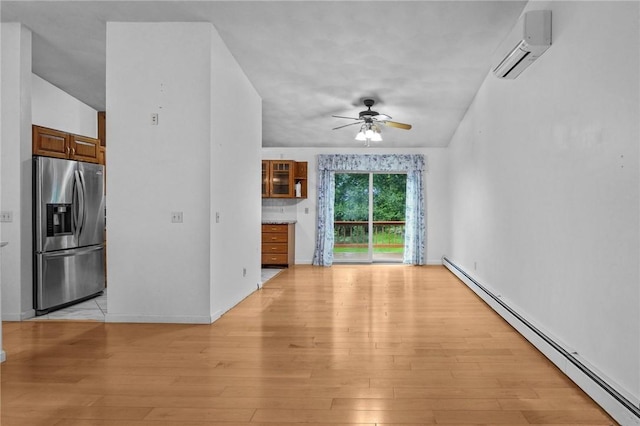 2 Birch St, Johnston, RI 02919 - unfurnished living room featuring a baseboard radiator, a wall unit AC, a ceiling fan, and light wood-type flooring