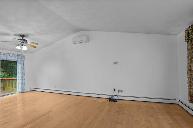 2 Birch St, Johnston, RI 02919 - spare room featuring a baseboard heating unit, a wall unit AC, wood finished floors, vaulted ceiling, and a ceiling fan