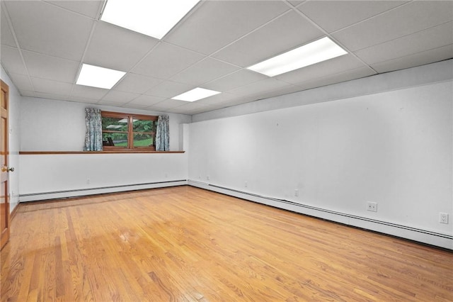 2 Birch St, Johnston, RI 02919 - spare room with wood finished floors, a baseboard heating unit, and a paneled ceiling
