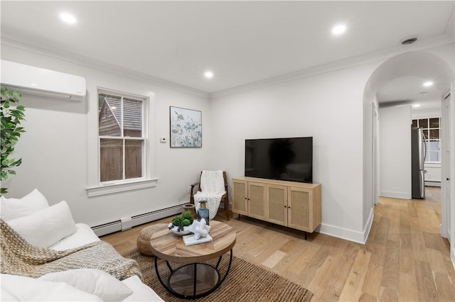 51 Poplar St Unit 1L, Newport, RI 02840 - living room with baseboard heating, a wall mounted air conditioner, arched walkways, light wood finished floors, and recessed lighting