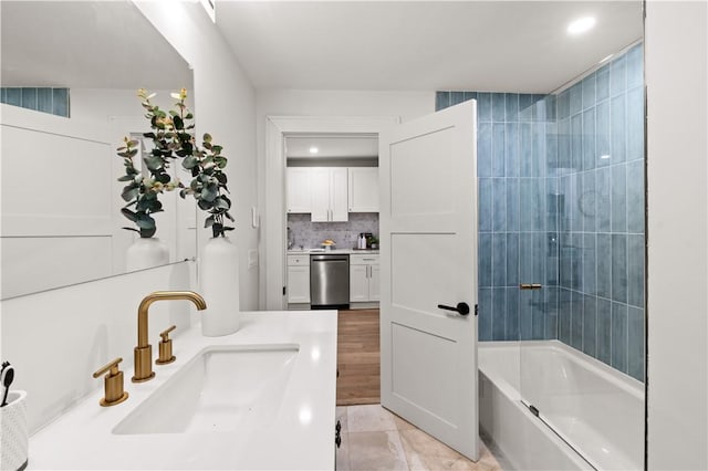 51 Poplar St Unit 1L, Newport, RI 02840 - full bathroom with vanity, bathtub / shower combination, and backsplash