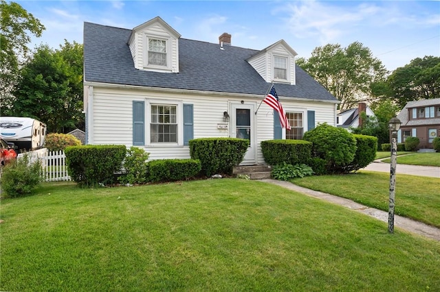3 Arrow Ave, Warwick, RI 02886 - cape cod house featuring a chimney and roof with shingles