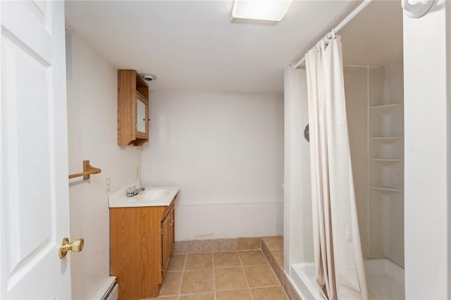 3 Arrow Ave, Warwick, RI 02886 - full bathroom with vanity, a shower stall, tile patterned floors, and a baseboard heating unit