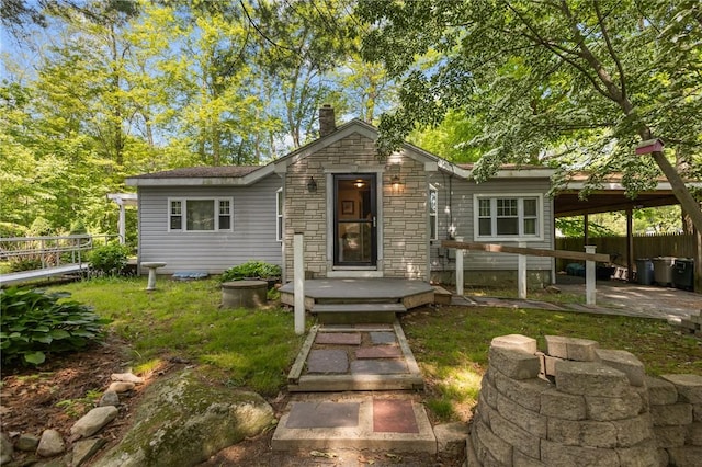 11 Daventry St, Glocester, RI 02814 - view of front of home featuring stone siding and a chimney