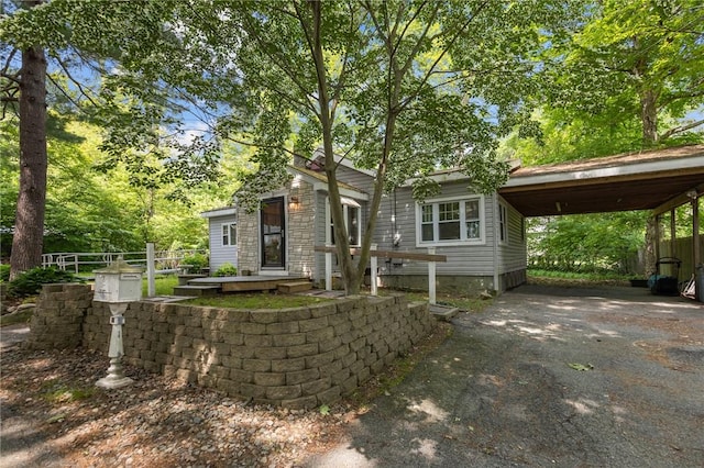 11 Daventry St, Glocester, RI 02814 - view of front of home featuring driveway and a carport
