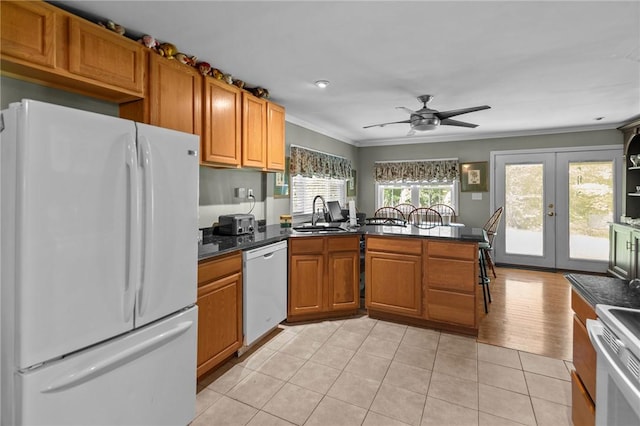 11 Daventry St, Glocester, RI 02814 - kitchen featuring white appliances, ornamental molding, french doors, dark countertops, and a ceiling fan