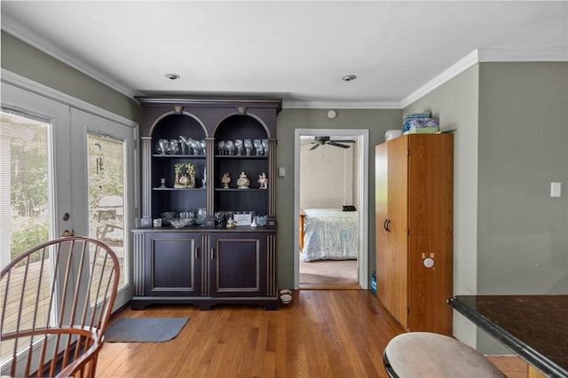 11 Daventry St, Glocester, RI 02814 - bar area featuring wood finished floors, crown molding, and ceiling fan
