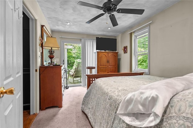 11 Daventry St, Glocester, RI 02814 - carpeted bedroom with access to outside, multiple windows, a ceiling fan, and recessed lighting