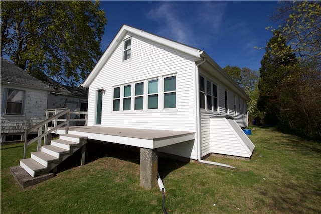 66 Beach St, Warren, RI 02885 - view of side of home with a wooden deck and a yard