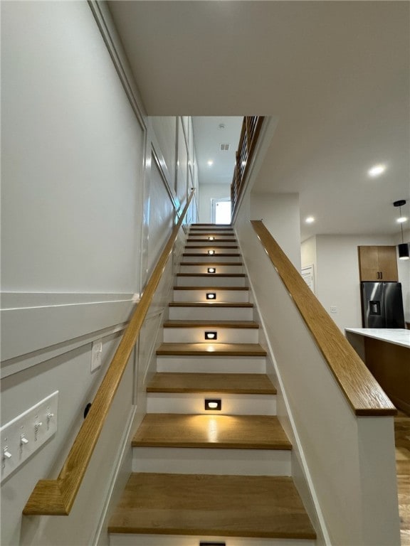 12 Daggett Ct Unit 2, Providence, RI 02906 - stairs with recessed lighting and wood finished floors