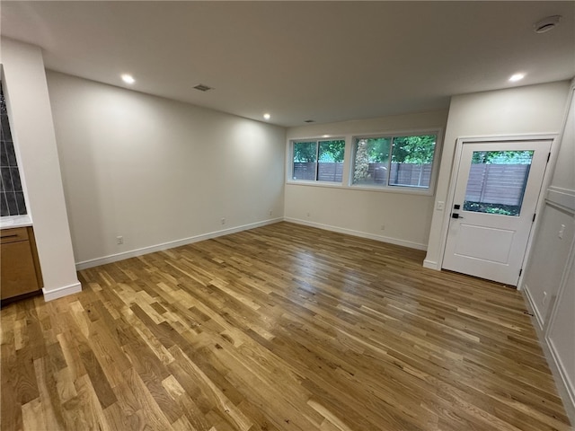 12 Daggett Ct Unit 2, Providence, RI 02906 - unfurnished room with light wood finished floors and recessed lighting