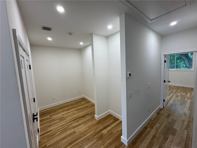 12 Daggett Ct Unit 2, Providence, RI 02906 - corridor with wood finished floors, attic access, and recessed lighting