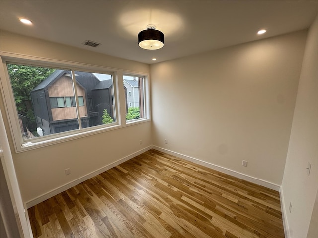 12 Daggett Ct Unit 2, Providence, RI 02906 - unfurnished room with wood finished floors and recessed lighting