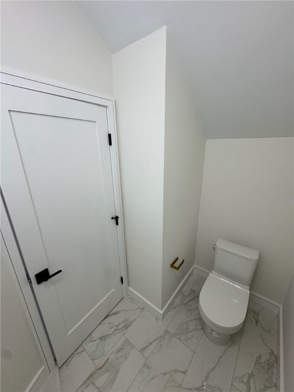 12 Daggett Ct Unit 2, Providence, RI 02906 - bathroom featuring marble look tiles