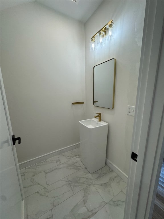 12 Daggett Ct Unit 2, Providence, RI 02906 - bathroom with marble finish floors and baseboards