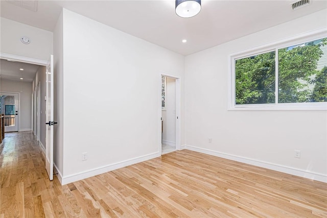 12 Daggett Ct Unit 2, Providence, RI 02906 - spare room featuring light wood-type flooring and baseboards