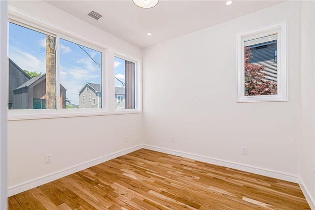 12 Daggett Ct Unit 2, Providence, RI 02906 - spare room featuring wood finished floors and recessed lighting