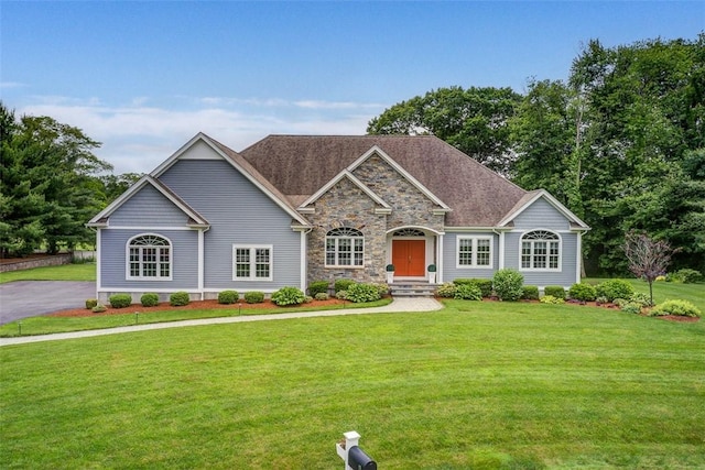6 Kenwood Ct, Seekonk, MA 02771 - craftsman-style house with a front yard, stone siding, and a shingled roof