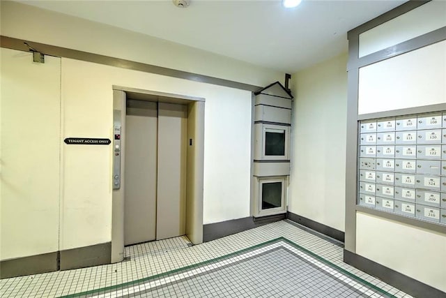 65 Weybosset St Unit 202, Providence, RI 02903 - kitchen with elevator and mail area