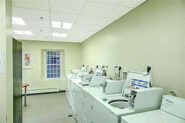 65 Weybosset St Unit 202, Providence, RI 02903 - community laundry room featuring independent washer and dryer and a baseboard heating unit