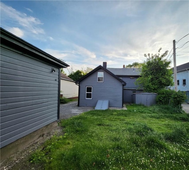 415 Broad St, Cumberland, RI 02864 - back of house featuring a yard and a patio area