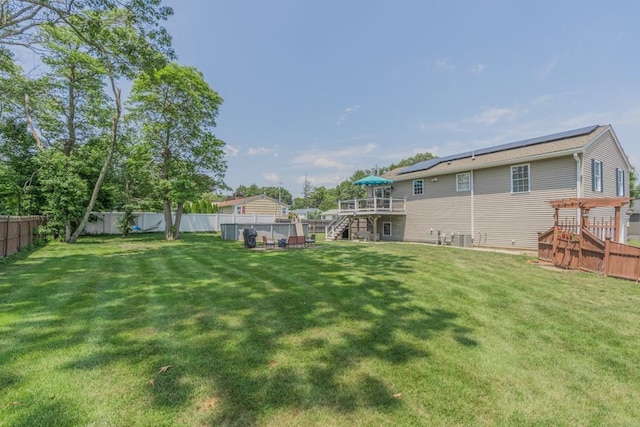 136 Youngs Ave, Coventry, RI 02816 - fenced backyard with stairway and a wooden deck
