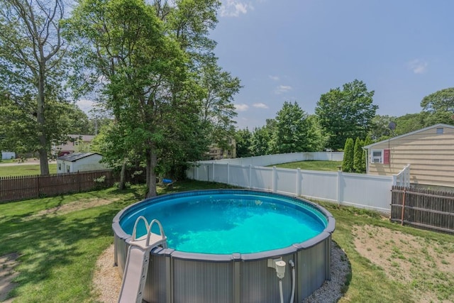 136 Youngs Ave, Coventry, RI 02816 - view of swimming pool featuring a jacuzzi and a fenced backyard