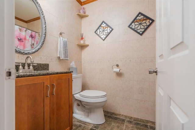 136 Youngs Ave, Coventry, RI 02816 - full bath with tile walls, vanity, crown molding, and tile patterned flooring