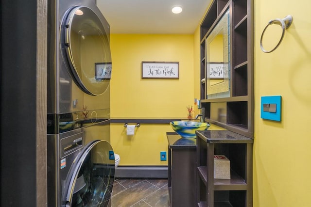 136 Youngs Ave, Coventry, RI 02816 - laundry room with stacked washer / drying machine and recessed lighting