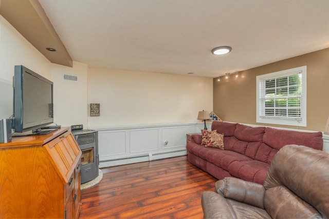 136 Youngs Ave, Coventry, RI 02816 - living area with baseboard heating and dark wood-style floors