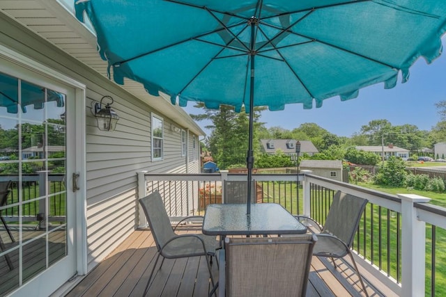 136 Youngs Ave, Coventry, RI 02816 - wooden deck featuring outdoor dining area and a yard