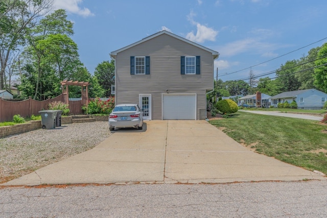 136 Youngs Ave, Coventry, RI 02816 - view of property exterior featuring driveway and an attached garage