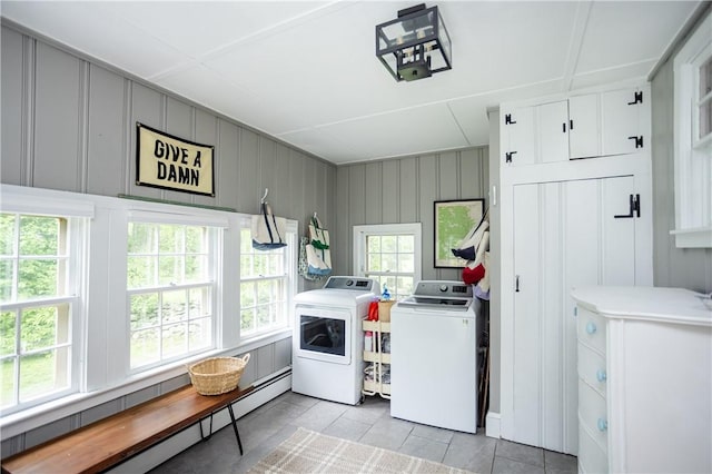 280 S Pierce Rd, East Greenwich, RI 02818 - laundry room featuring washer and clothes dryer, healthy amount of natural light, a baseboard heating unit, light tile patterned floors, and a decorative wall