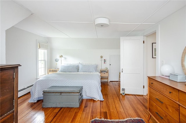 280 S Pierce Rd, East Greenwich, RI 02818 - bedroom with a baseboard radiator and hardwood / wood-style flooring