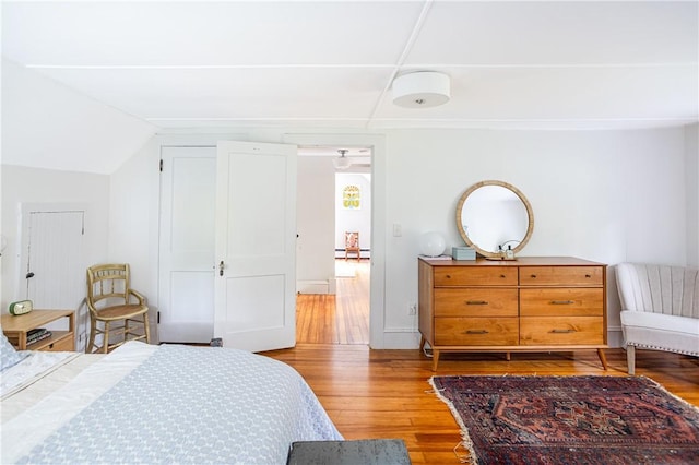 280 S Pierce Rd, East Greenwich, RI 02818 - bedroom featuring light wood finished floors, a baseboard radiator, and lofted ceiling