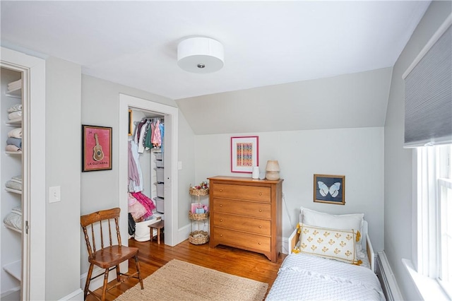 280 S Pierce Rd, East Greenwich, RI 02818 - bedroom with wood finished floors, vaulted ceiling, and a closet