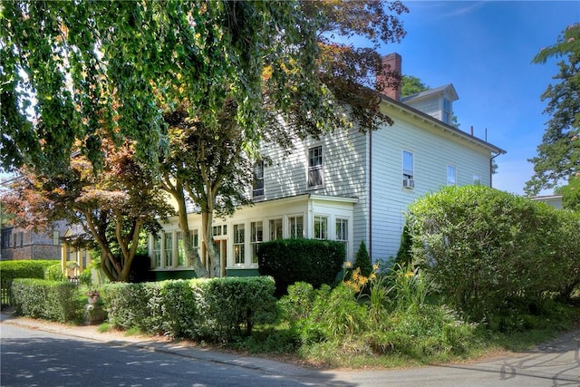 24 Old Beach Rd, Newport, RI 02840 - view of side of property with a chimney