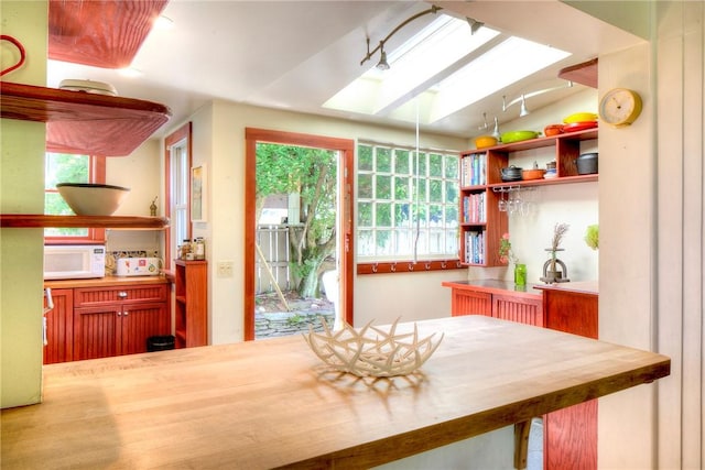 24 Old Beach Rd, Newport, RI 02840 - dining room featuring a skylight