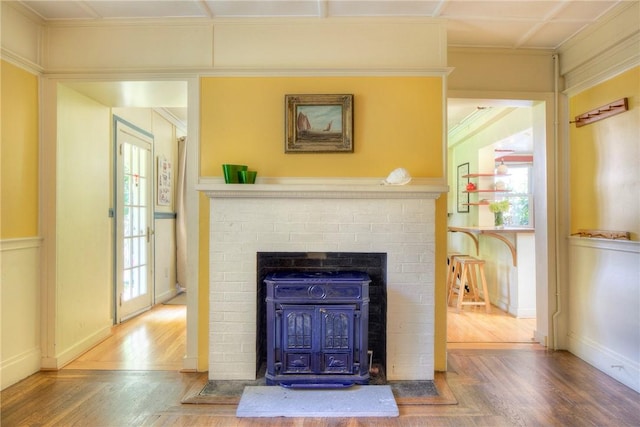 24 Old Beach Rd, Newport, RI 02840 - detailed view of wood finished floors and a brick fireplace