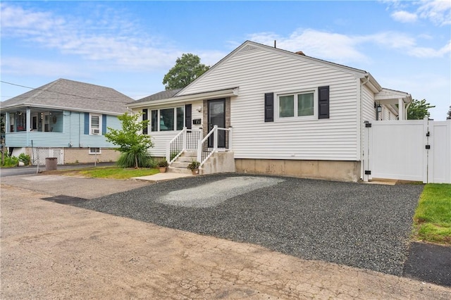 15 Wayland St, East Providence, RI 02914 - bungalow-style house featuring a gate
